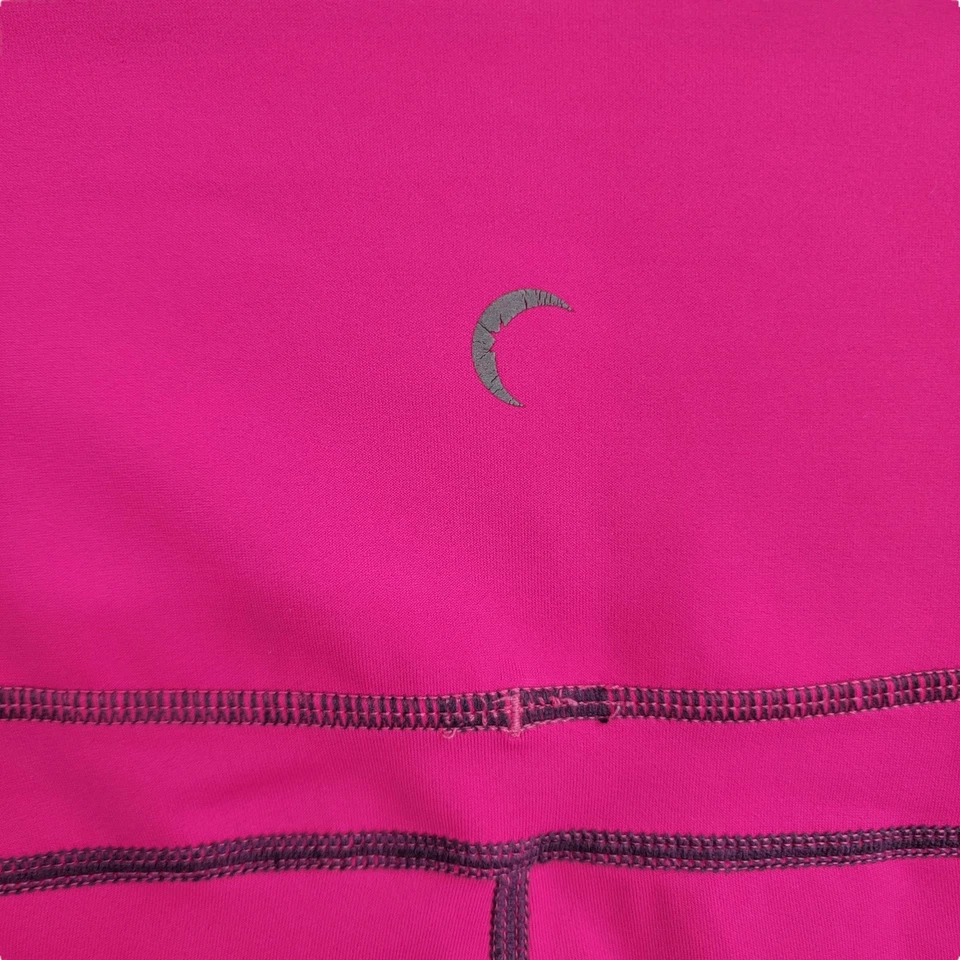 Leggings capri recortados con bolsillo rosa neón Zyia Foto 4 de 4