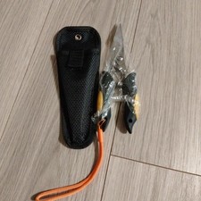 Fishing pliers with stainless steel case and strap for fishing