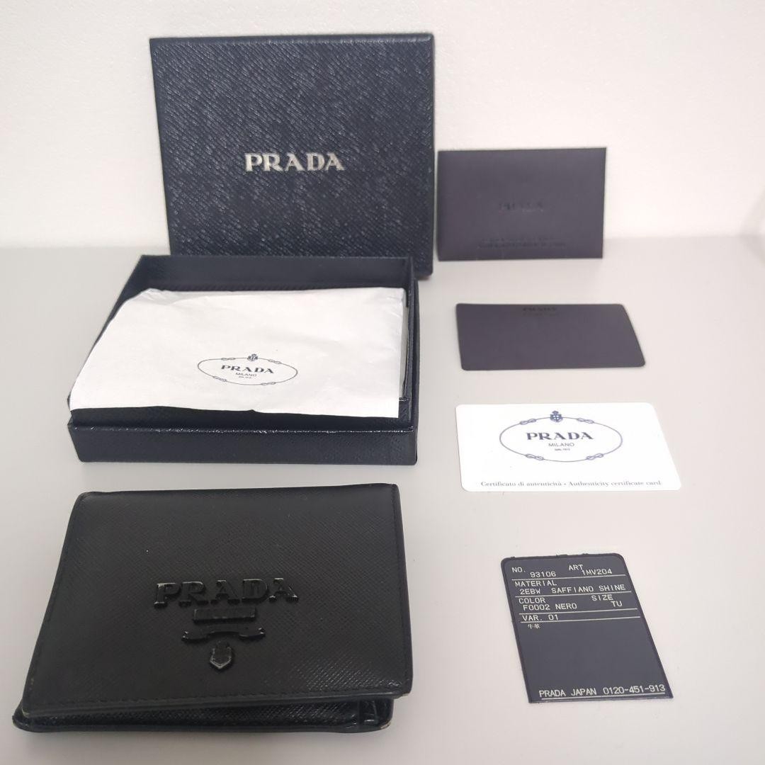 Prada Saffiano Black Bifold Wallet Includes Box and Guarantee Card