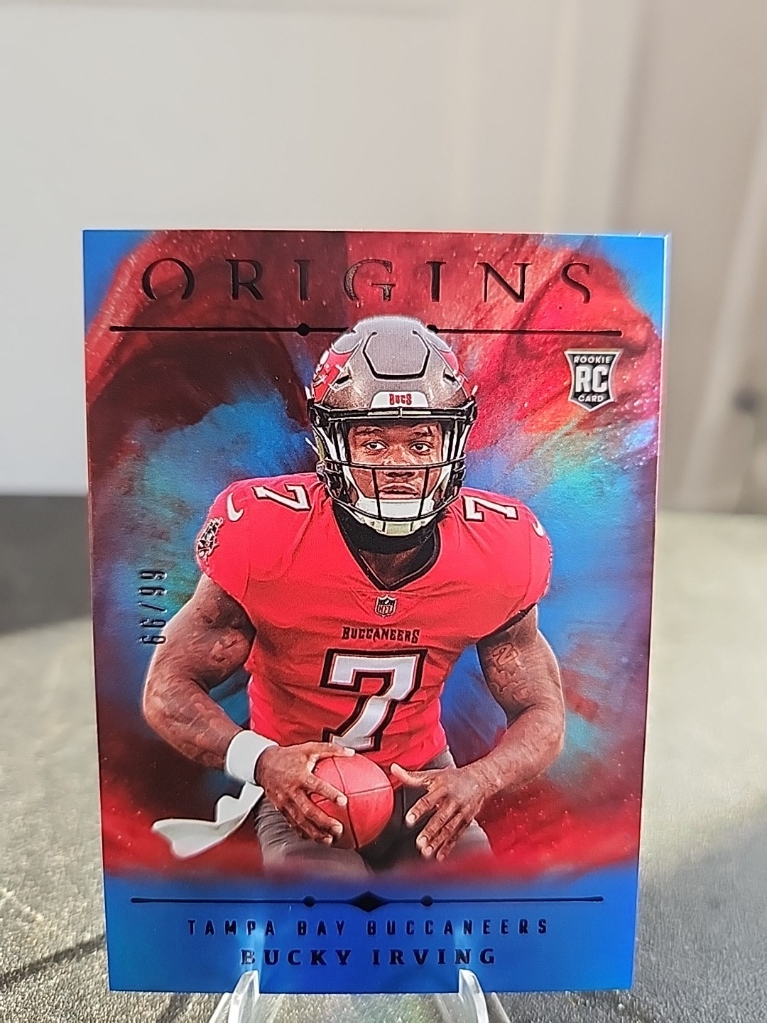 2024 Panini Origins - Rookies Bucky Irving #107 Holo Blue /99