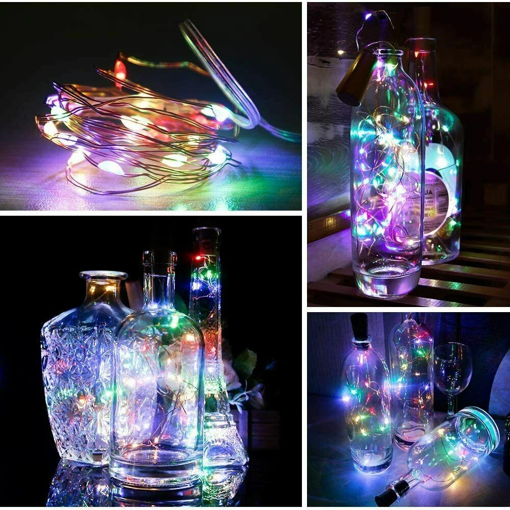 Glass bottle with cork string lights at night