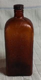VINTAGE AMBER GLASS PEDIGREE BOURBON WHISKEY SPIDER WEB BOTTLE