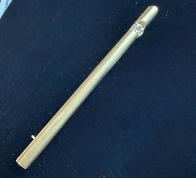 Stab-Brosche , 750/- GG, 0,24 ct Brillant IF