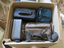 4 LARGE CAMERA CASES ETC. GOOD QUALITY. BARGAIN.