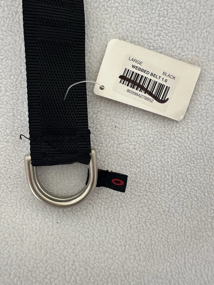 Cinturón Oakley Webbed 1.0 negro claro talla grande Oakley AOP hebilla de anillo plateado Foto 4 de 4