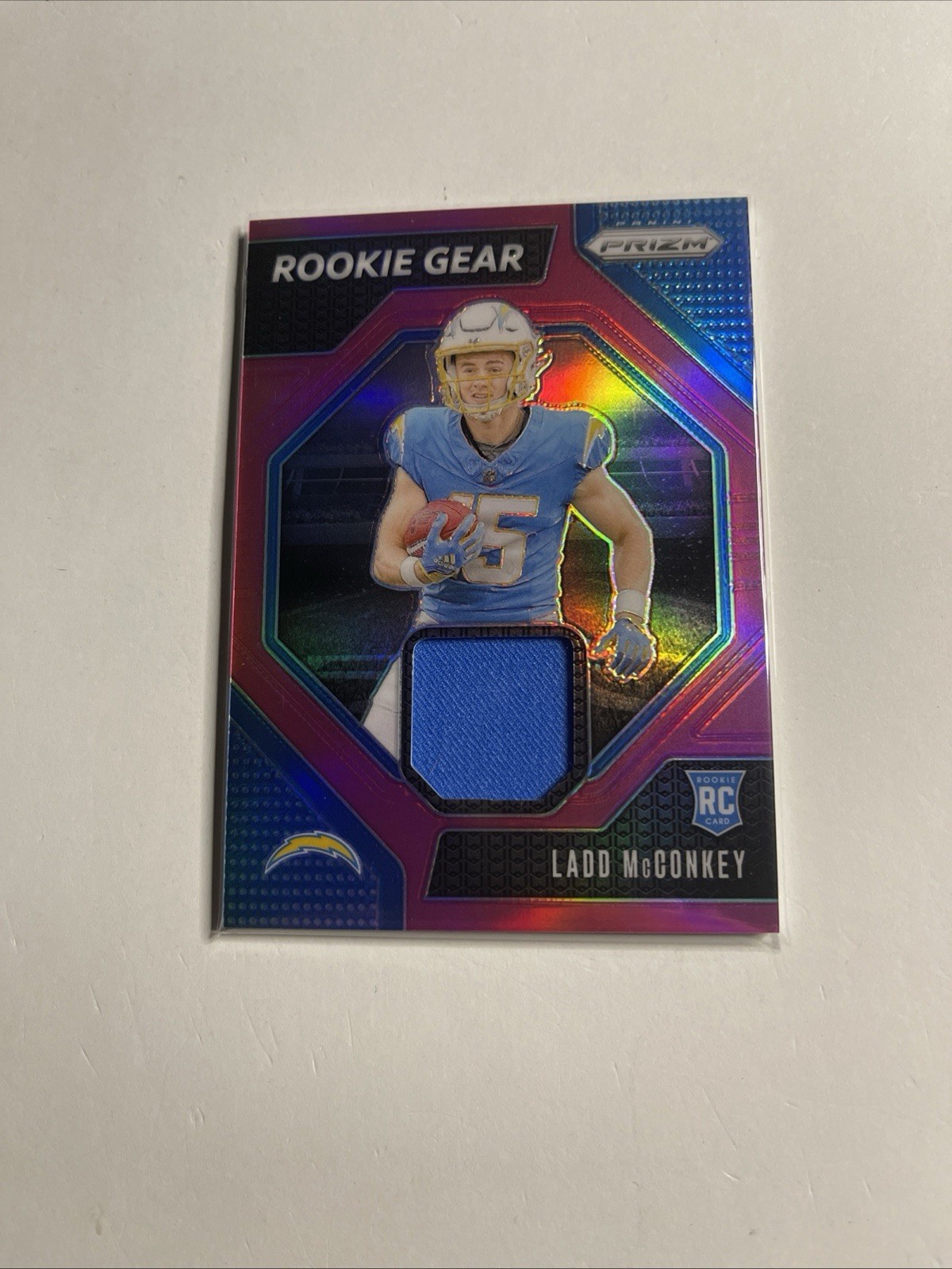 2024 Panini Prizm - Rookie Gear Ladd McConkey #RG-LMY Pink Prizm (MEM, RC)