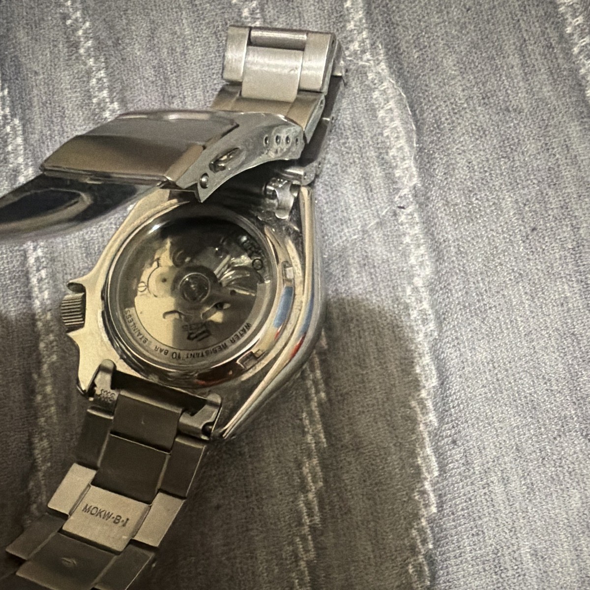 Seiko 5 Automatic Orange Dial Day/Date Diver Black Bezel Steel Bracelet View 3