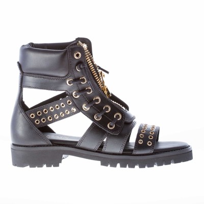 black boots with gold hardware