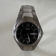 Citizen Eco-Drive Titanium Quartz Dress Watch...