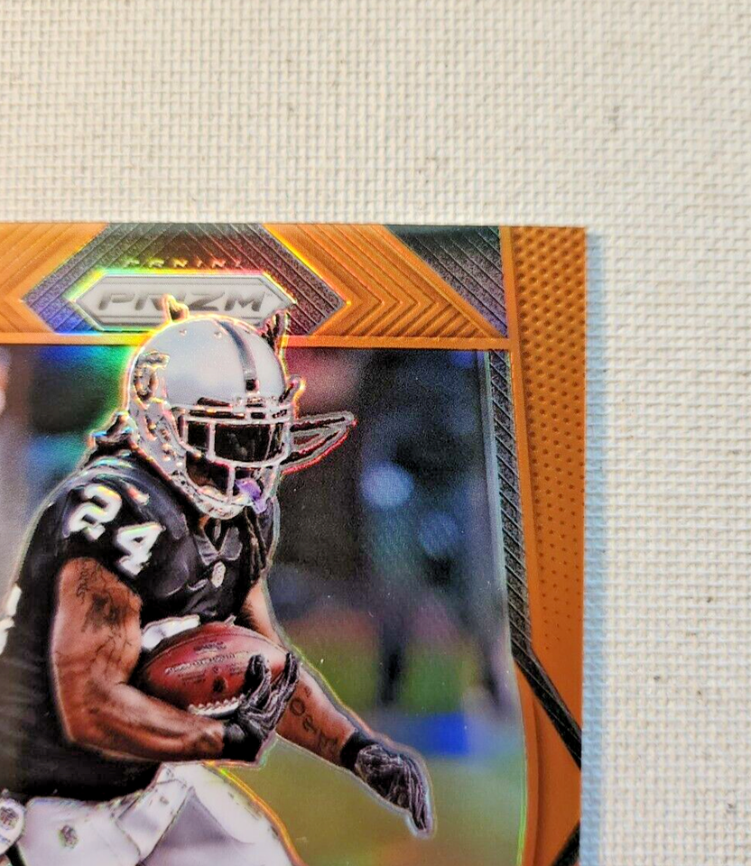 MARSHAWN LYNCH Orange Prizm Serial 'd /275 Card [ 84 2017 NFL Raiders