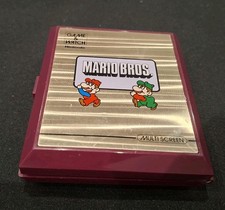 Thumbnail of ebay&reg; auction 147357626780 | Nintendo Game and Watch Mario Bros 1983 Multi Screen Model MW-56 