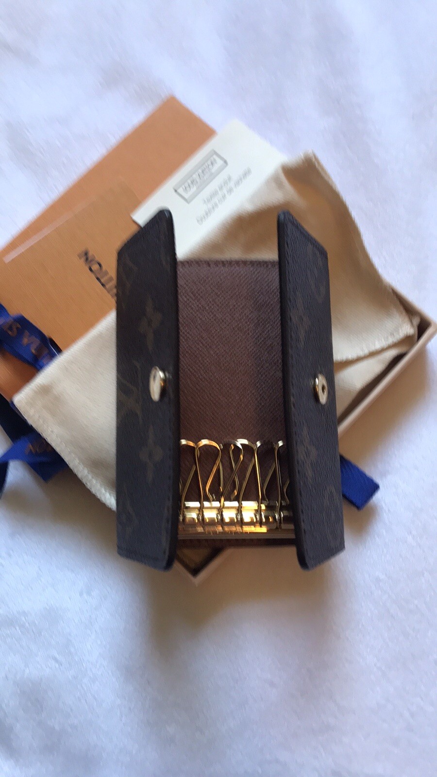 Shop Louis Vuitton Monogram reverse key holder and bag charm (M69317) by  なにわのオカン