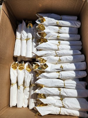 pre-bundled, gold utensils wrapped in napkins, outdoor wedding