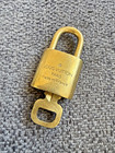 LOUIS VUITTON: Gold/Brass, Metal "LV" Logo Padlock & Key Set #310 (sw) — photo 2