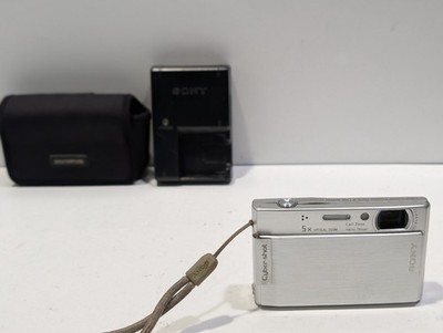 Sony Cyber-shot DSC-T100 8.1MP Silver Digital Camera w Case Charger [NEEDS WORK]