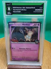 Team Rocket's Mimikyu Stamped #87 Cosmos Holo Pokemon Destined Rivals Grade 8 NM