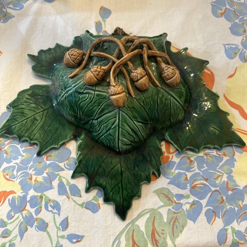 vintage Maxcera leaf-shaped bowl featuring a green glaze textured acorn design