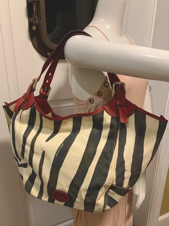 Dooney &Bourke XLarge Zebra Print Canvas W/Red Leather Trim Bucket/Travel Bag