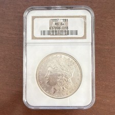 1887 Morgan Dollar Graded MS 64 NGC Silver $1 Coin