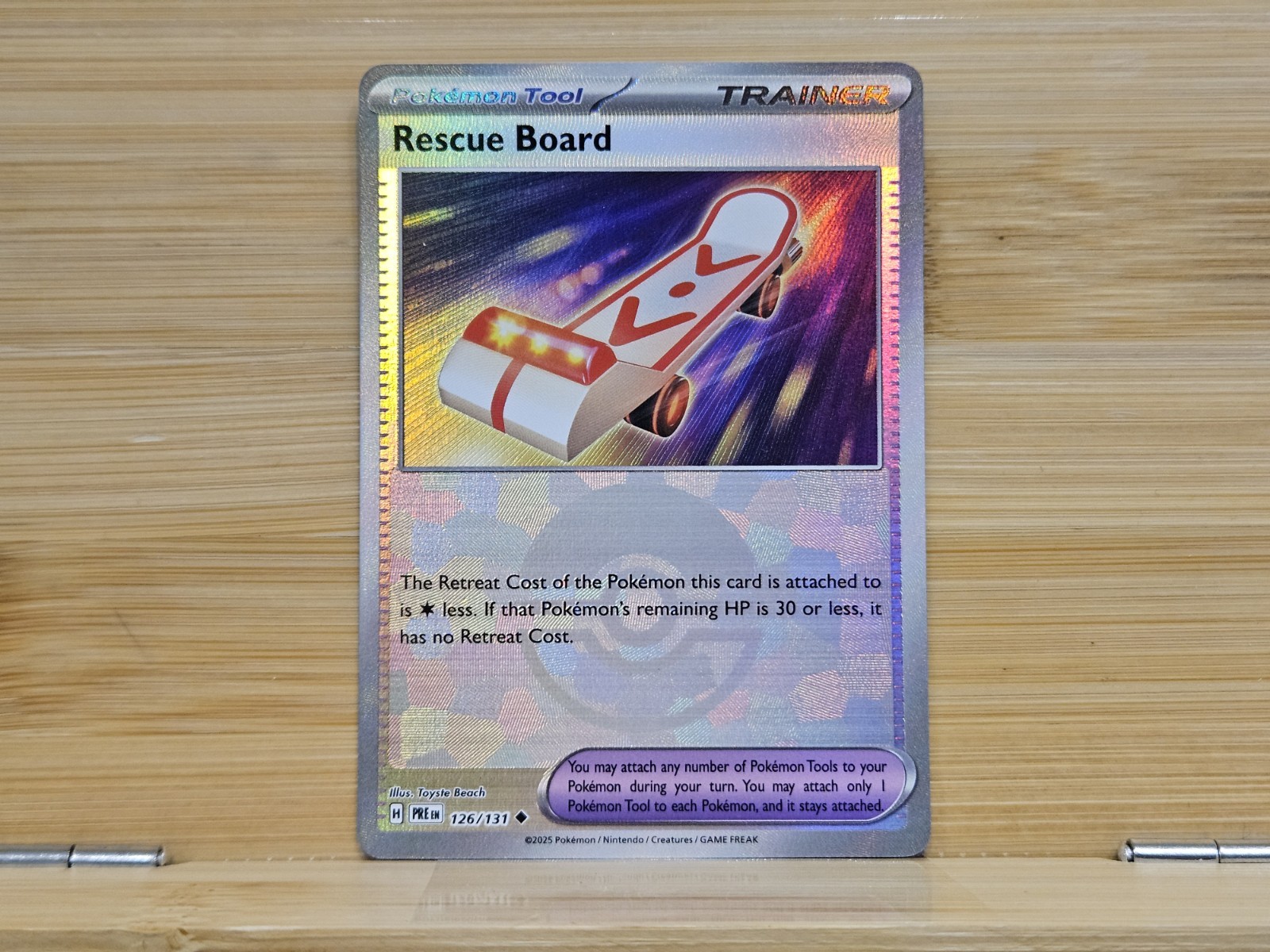 Rescue Board (Poke Ball Pattern) 126/131 Sv: Prismatic Evolutions Holo - NM