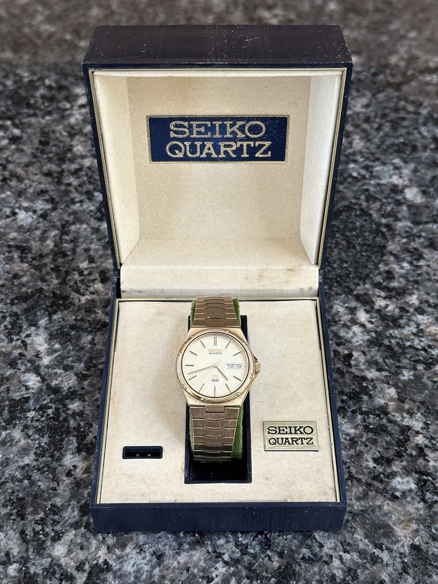 Vintage Seiko SQ 100 Quartz 6923-7059 Day Date Gold Watch with Box