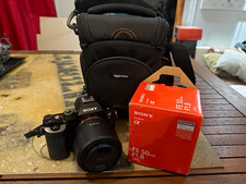 Sony Alpha 7 24.3MP Black Mirrorless Camera + FE 50mm f/1.8 Lens + Case