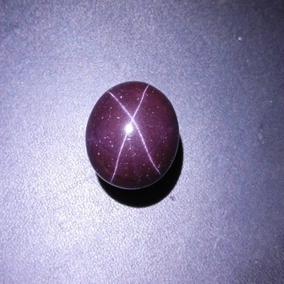 63 Carat 24.6x21x10.6 MM Natural 4-Ray Star Purple Red Garnet Oval Cabochon