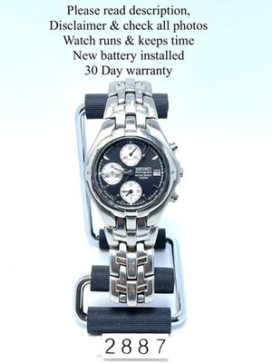 Seiko 7T62-0CK0 Alarm Chronograph Reverse Panda Dial Watch In Great Condition.