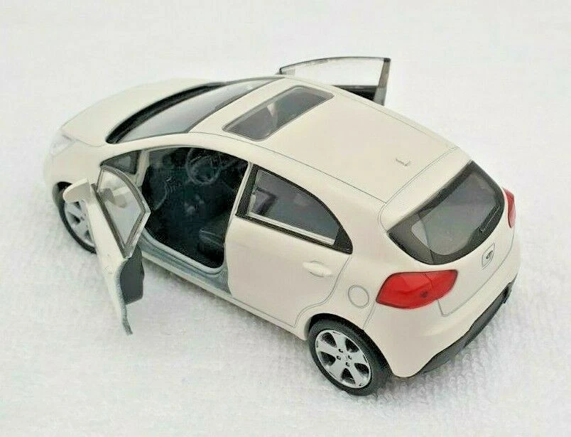 BLITZ VERSAND KIA RIO creme Welly Modell Auto 1:34 NEU & OVP BOX - Bild 2 von 3