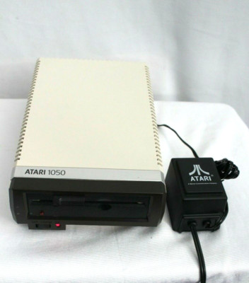 Atari 1050 Floppy Disk Drive With Power Supply (powers on) but is Untested.