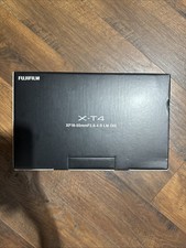 Fujifilm X-T4 Mirrorless Camera Black with lens and vertical battery grip