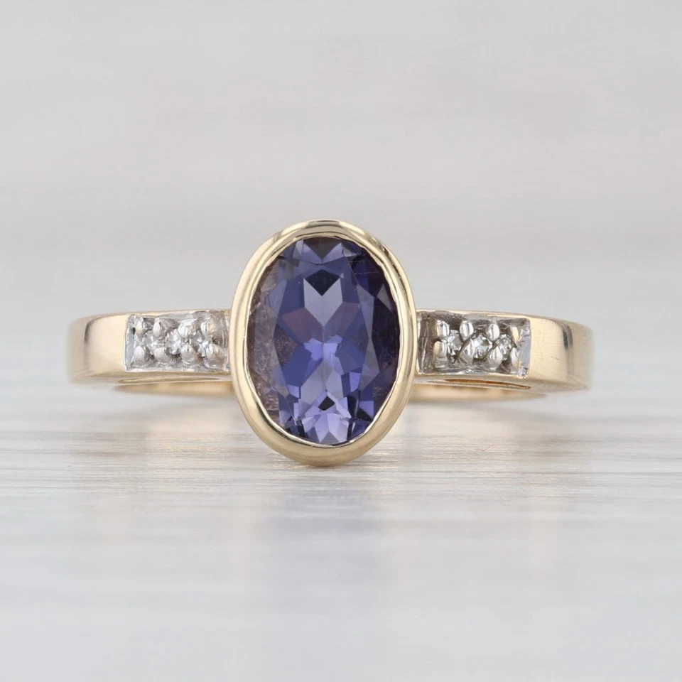 Anillo solitario de diamantes de iolita ovalado de 1,42 quilates de oro amarillo de 14 k talla 7 bisel Foto 2 de 4
