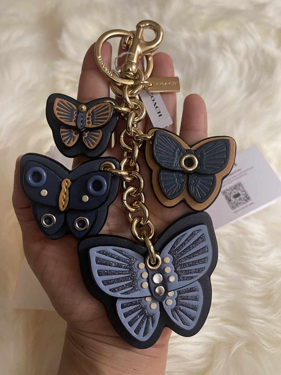 COACH Butterfly Cluster Mix Bag Charm Keychain Gold / Denim COACH Butterfly Cluster Mix Bag Charm Keychain Gold / Denim