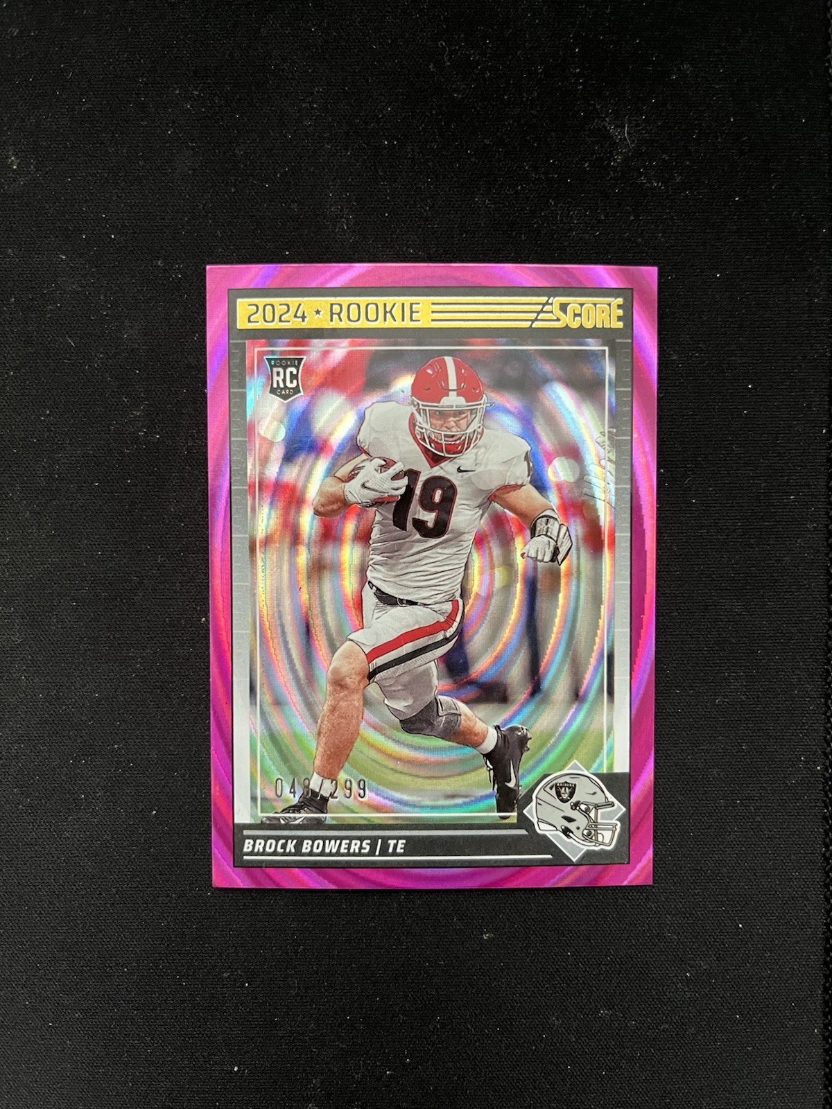 2024 Panini Score - Brock Bowers #310 Pink Ellipse /299 (RC)