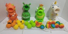 LOT 4 HOG WILD SQUEEZE POPPER TOYS 24 FOAM BALLS UNICORN MONSTER GUMP OPTO OGRE