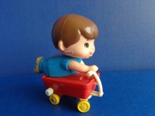 VINTAGE TOMY WIND UP KID A LONG BOY WITH WAGON