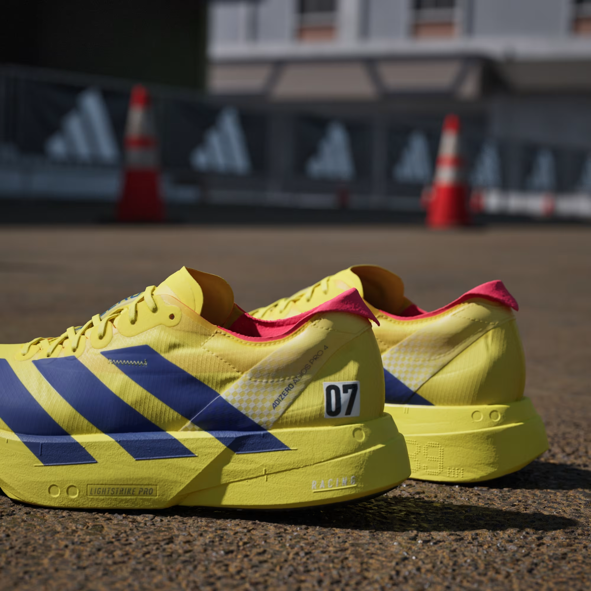 Adizero Adios Pro 4 Running Shoes in Pure Sulfur / Lucid Blue