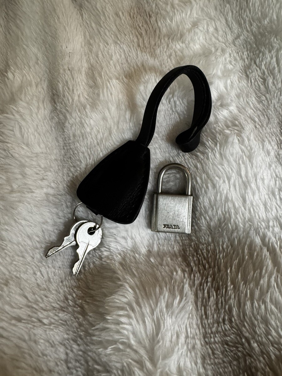 Authentic Prada Silver Lock Keys With Black Leather Clochette