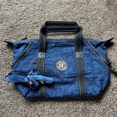 Kipling Nylon Adjustable shoulder bag. Converts From Rectangle To Angled Top Bag