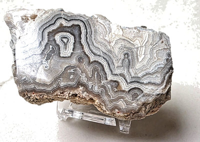 Face polished Georgia LACE Agate 50.6 grams . Beautiful banding Free Stand !