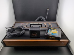 Atari 2600 Video Computer System (Woodgrain 4-Switch) - Working