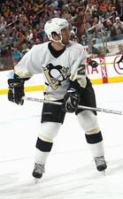 Ric Jackman Pittsburgh Penguins skates at the NHL game with - Ice Hockey Photo