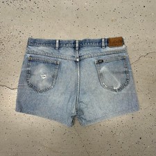 VTG Lee Distressed denim shorts with a worn look