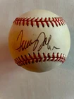 Tommy John Autographed Baseball with JSA COA