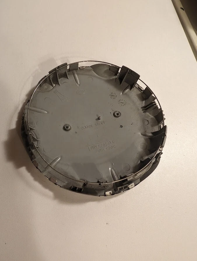 Tapacubos tapa central Infiniti I35 2002-2004 OEM🔥 40315AROO Foto 2 de 4