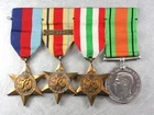 Mounted group British WW2 medals - 39/45, Africa, Italy Stars and Defence Medal