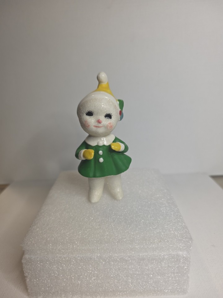 A Harold Gale-era Mica-dusted ceramic pixie snowbaby from Japan — tiny, eerie, and impossibly charming in the way only mid-century holiday kitsch can be.