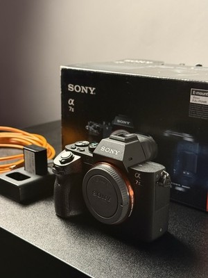 Sony Alpha A7 24.3 MP Mirrorless Digital Camera - Black (with 28-70mm Lens)