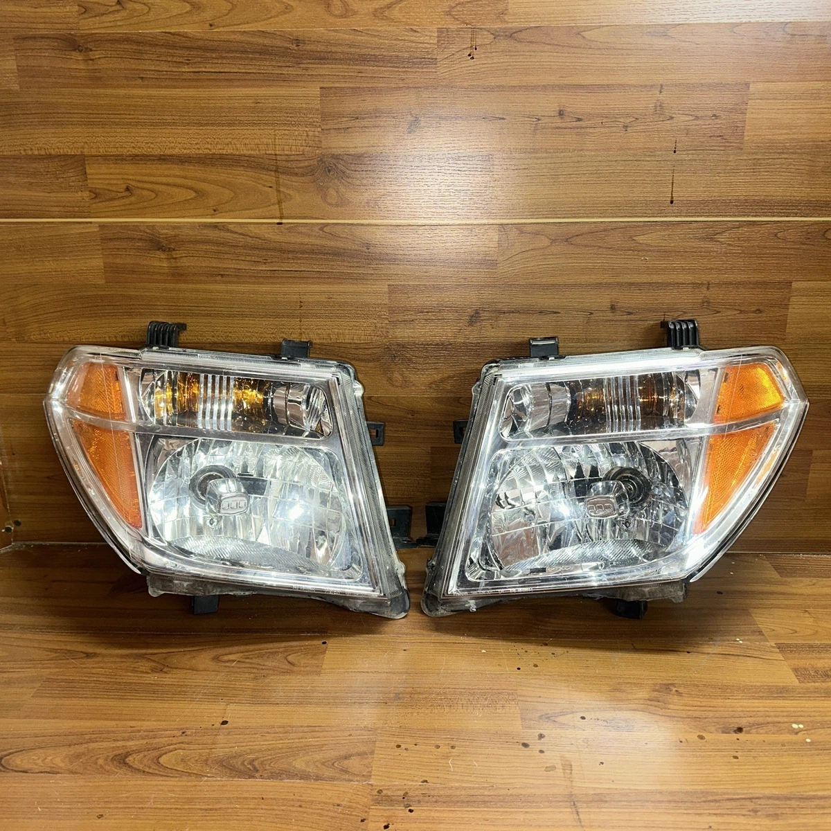 Genuine OEM Headlights for Nissan Frontier for sale | eBay