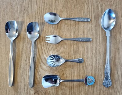 6 gemischte Metalllöffel und 1 Gabel Besteck Set.